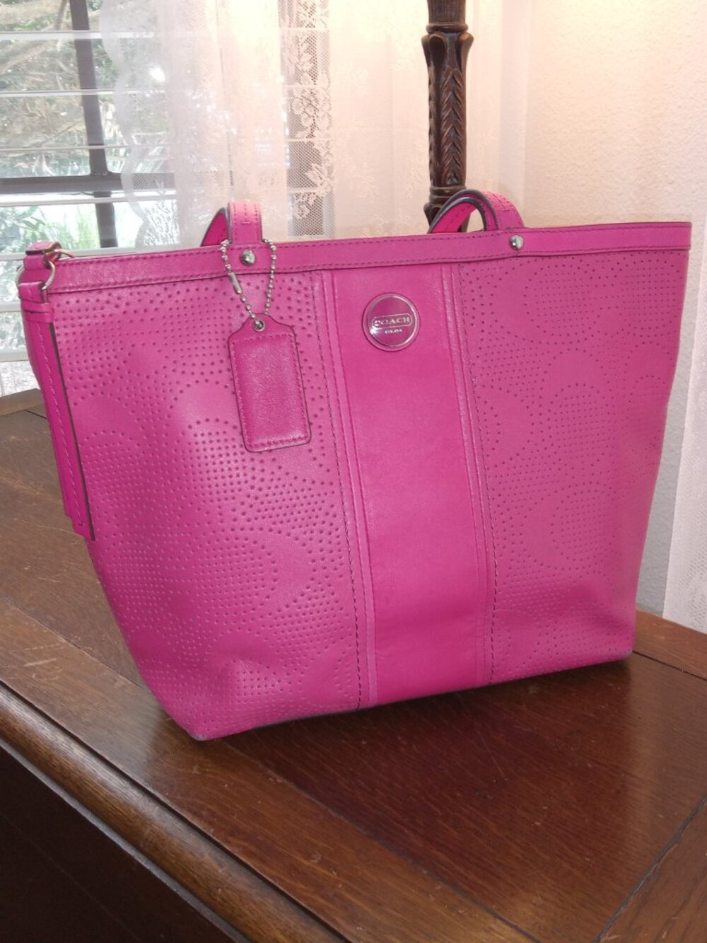 Pink Coach perforated leather carryall shoulder bag